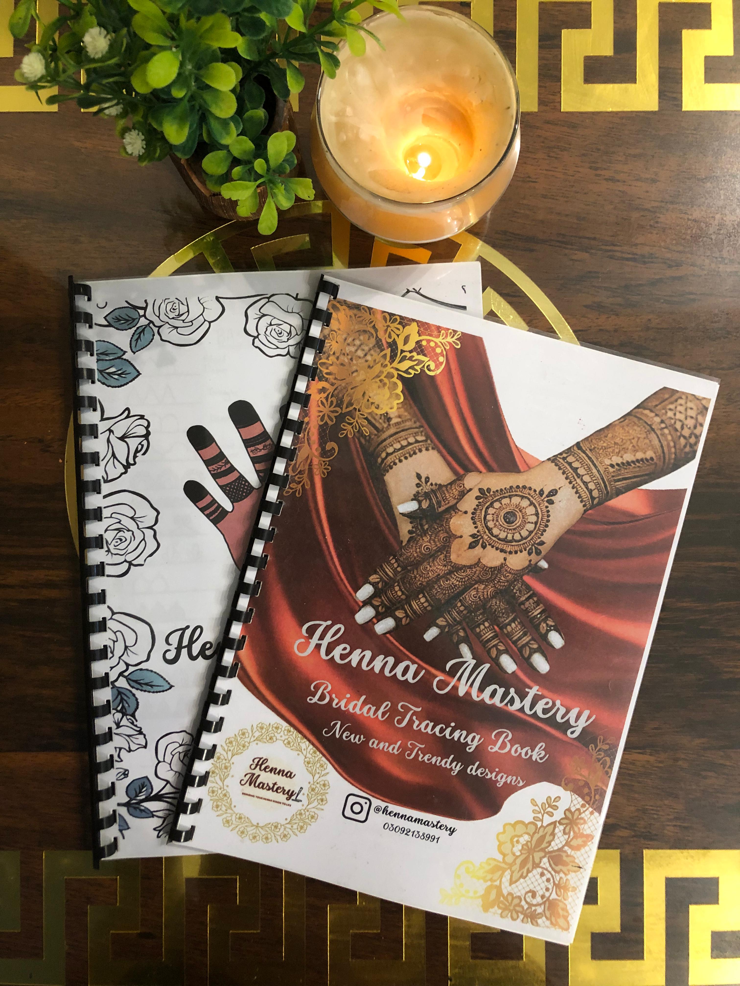 Pack of any 2 Henna Tracing Books of your choice with Reusable Acrylic sheet, a practice cone and free Dc.