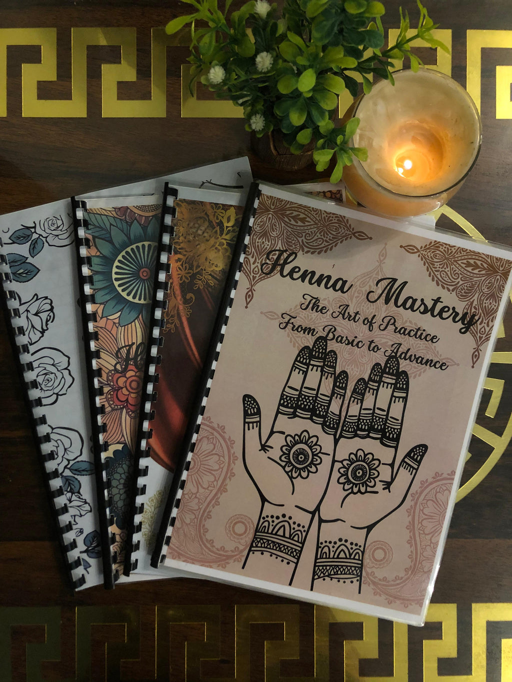 Pack of any 2 Henna Tracing Books of your choice with Reusable Acrylic sheet, a practice cone and free Dc.